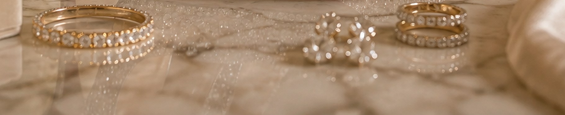 Bands and earrings on marble